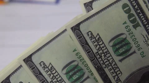 Close-up of counting 100 dollar paper bills. FullHD Vidéo 142506281