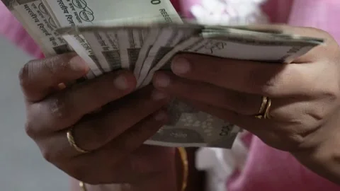 Close-up of the counting currency notes by a person Stock Footage 314607305