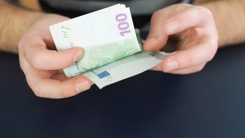 Close up of counting money. Nominal of 100 euro notes counting. Business bills m Stock Footage 121772813