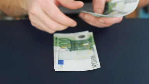 Close up of counting money. Nominal of 100 euro notes counting. Business bills m Stock Footage 121772890