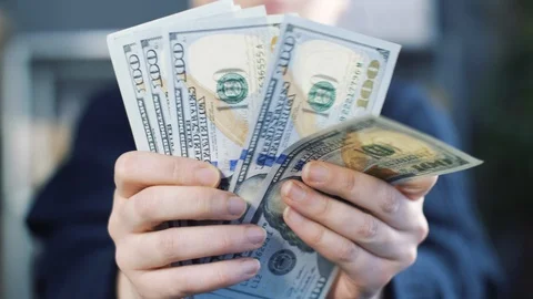 Close up of counting money. Nominal of 100 usa dollar notes counting. Business b Stock Footage 121776454