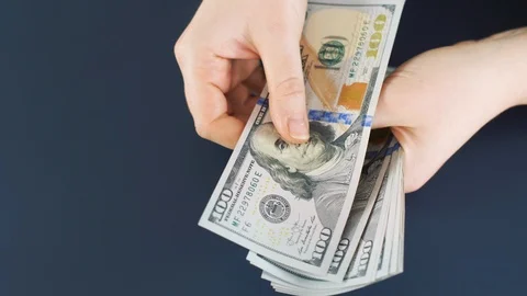 Close up of counting money. Nominal of 100 usa dollar notes counting. Business b Stock Footage 121779835