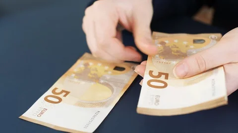Close up of counting money. Nominal of 50 euro notes counting. Business bills mo Stock Footage 121773393