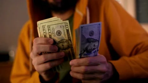 Close-up counting stacks of dollars by hand. Finance and money payment concept. Stock-Footage 336262276