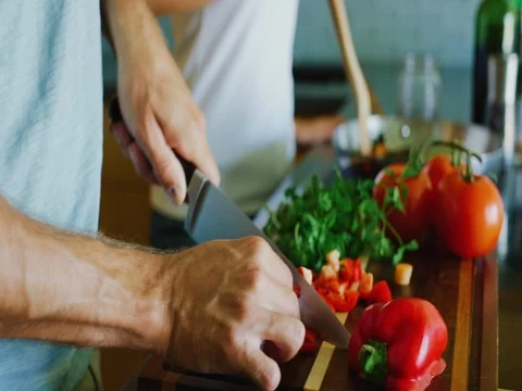 Close Up of Couple Cooking in the Kitchen Stock Footage 83942998