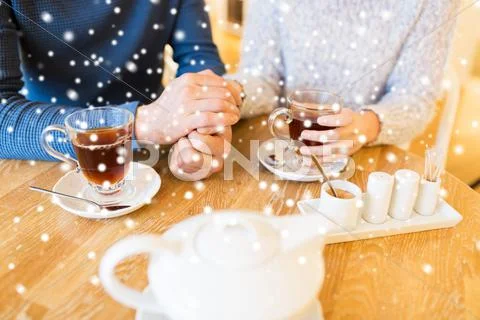 Close up of couple drinking tea at cafe Stock Photos