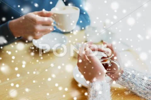 Close up of couple drinking tea at cafe Stock Photos