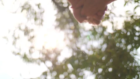 Close up of couple giving hands each other Lifestyle Slow motion Stock Footage 274155753