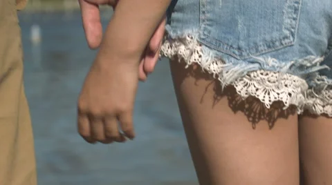 Close up of couple holding hands. Stock Footage 67396621
