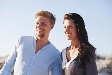 Close-up of a couple smiling on the beach Stock Photos