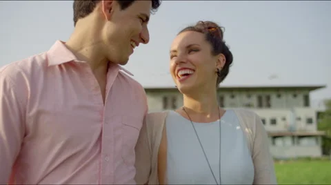 Close up of couple walking and talking Stock-Footage 63075958