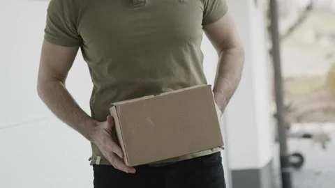 Close up of courier handing over a package Stock Footage 149293897
