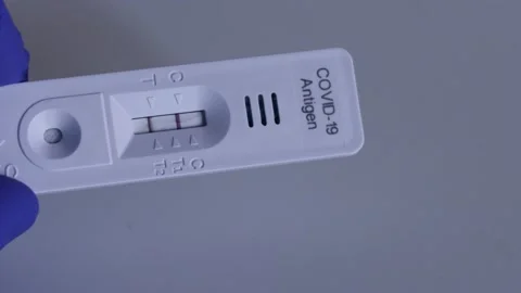 Close-up of Covid-19 Antigen Test Showing Positive Outcome Video stock 169010605
