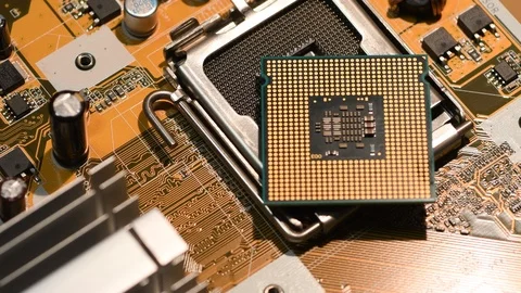 Close up of CPU Chip Microprocessor on PC Motherboard. Stock Footage 95066493