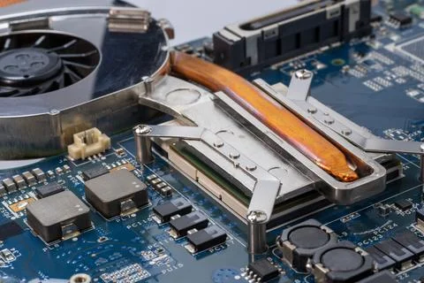 A close up of CPU computer motherboard PCB with chips on it 写真素材