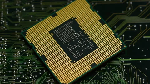 Close up of CPU Computer Processor over a printed electronic circuit board Stock Footage 160323437