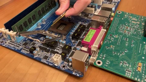 Close up of CPU Micro Processor assembly Computer Motherboard. Removing and moun Stock Footage 167328143