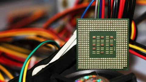 Close up of CPU Processor over Computer Motherboard. Tecnology background. Stock Photos