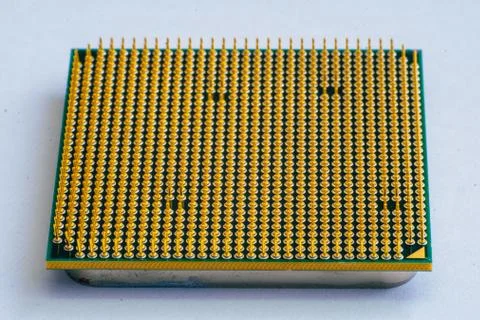 Close up of CPU Processor over Computer Motherboard. Tecnology background. Stock Photos