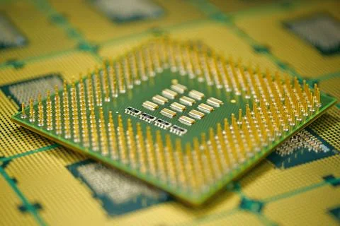 Close up of CPU showing tiny metal pins and their precise alignment Stock Photos
