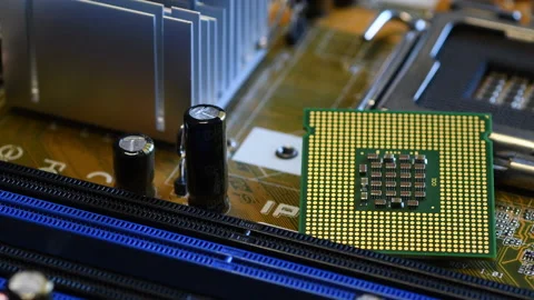 Close up of CPU Socket and his Chip over modern PC Motherboard Stock Footage 136329467