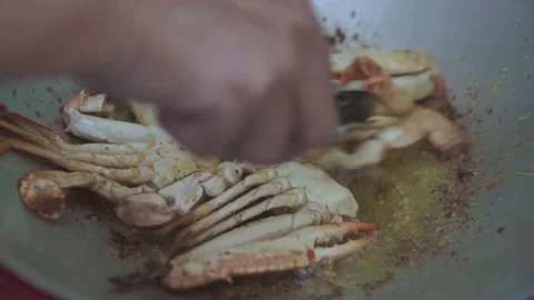 Close up of crab fried in boiling oil. Crab fried is favourite food in mostly Stock Footage 103560128