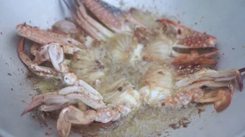 Close up of crab fried in boiling oil. Crab fried is favourite food in mostly Stock Footage 103563456