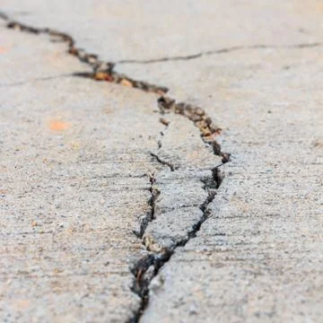 Close up of crack cement road Stock Photos