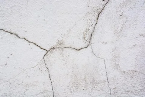 Close up cracked cement plaster texture background Stock Photos
