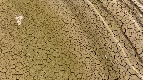 Close up of cracked dry ground texture showing drought conditions Stock Footage 324539304