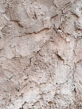 Close-up cracked plaster texture on old wall Stock Photos