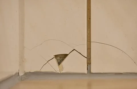 Close-up of Cracked Tile in Wall Stock Photos