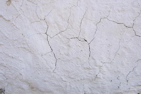 Close-up of cracked white wall texture Foto stock