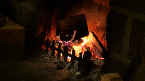 Close-Up of Crackling Flickering Flames in an Open Fire Stock Footage 280559555
