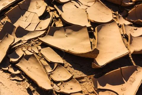 Close up cracks dry riverbed with surface of brown mud. Namibia, Damaraland,  Stock Photos