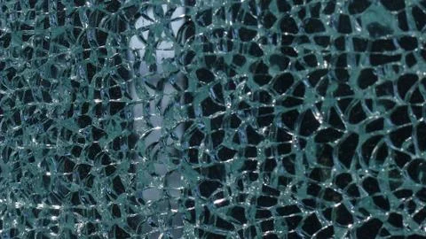 A Close-up of Cracks in the surface of glass Foto stock