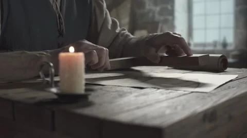 Close up of craftsman hands checking an ornithopter blueprint with a wooden comp Stock Footage 338991251