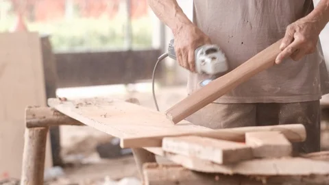 Close up of craftsman use polishing machine for ax wood working Video stock 117931210