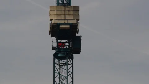 Close-up of crane driver on building site in leeds uk Stock Footage 90376057