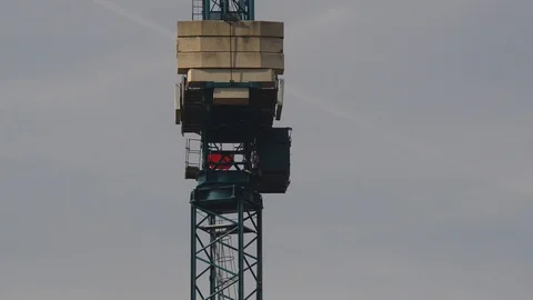 Close-up of crane driver on building site in leeds united kingdom Stock Footage 90376896
