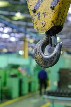 Close up crane hook for overhead crane in factory Stock Photos