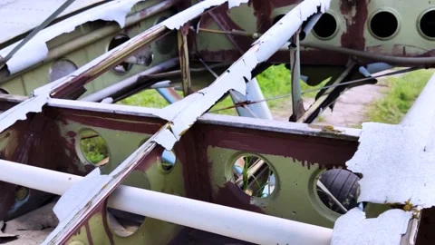 Close-up of a crashed airplane wing. The metal frame and internal parts are visi Video stock 155779790