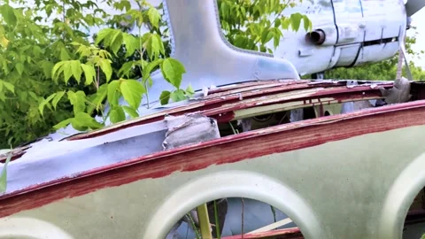 Close-up of a crashed airplane wing. The metal frame and internal parts are visi Video stock 155779960