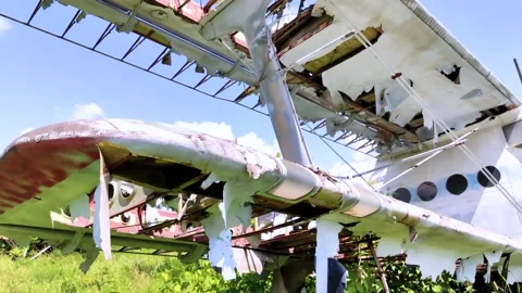 Close-up of a crashed airplane wing. The metal frame and internal parts are visi Video stock 155780084