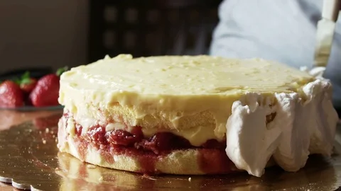 Close up of cream is spread on cake 動画素材 73746849