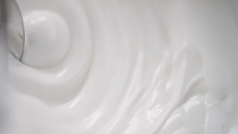 Close up of creamy supstance getting mixed Stock Footage 100593560