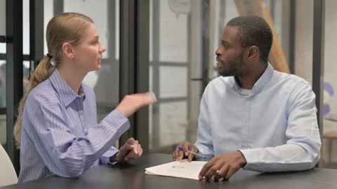 Close up of Creative African Man Talking with Female Colleague Stock-Footage 309514189