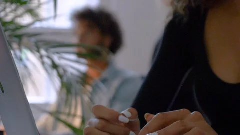 Close-up of creative female executive using laptop at her desk Stock-Footage 114872873