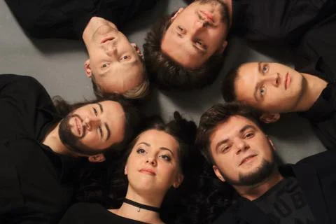 Close up. creative group of happy young people.the concept of like-minded people Stock Photos