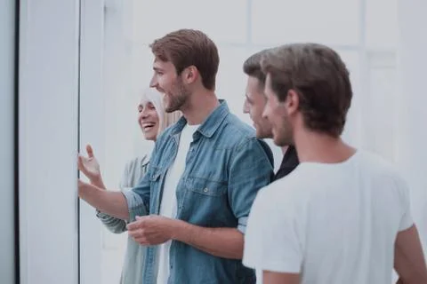 Close up. creative team of colleagues standing in the office. Stock Photos